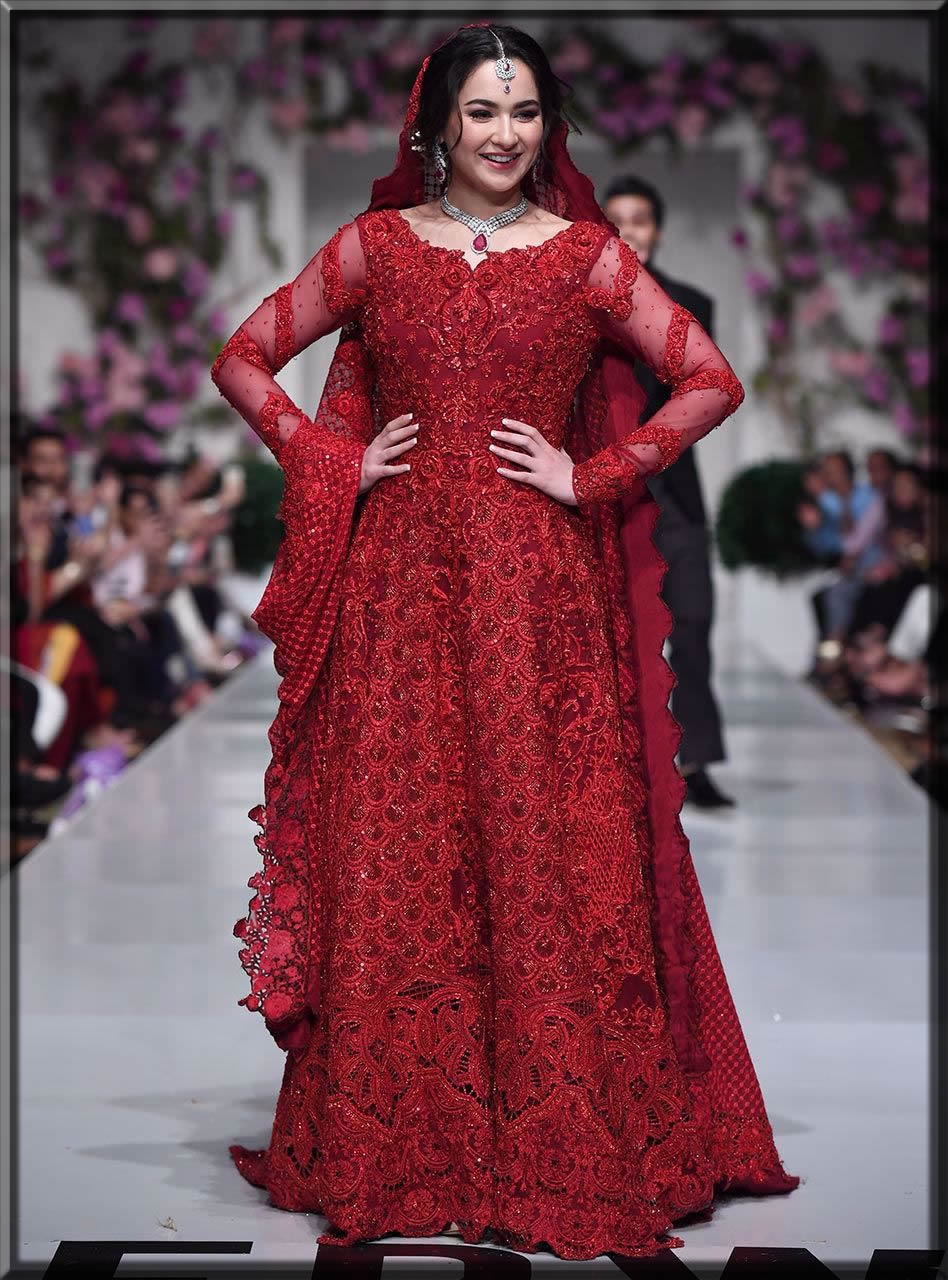 hania amir looking stunning in red bridal gown