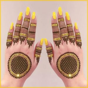 yellow glitter mehndi design for bride