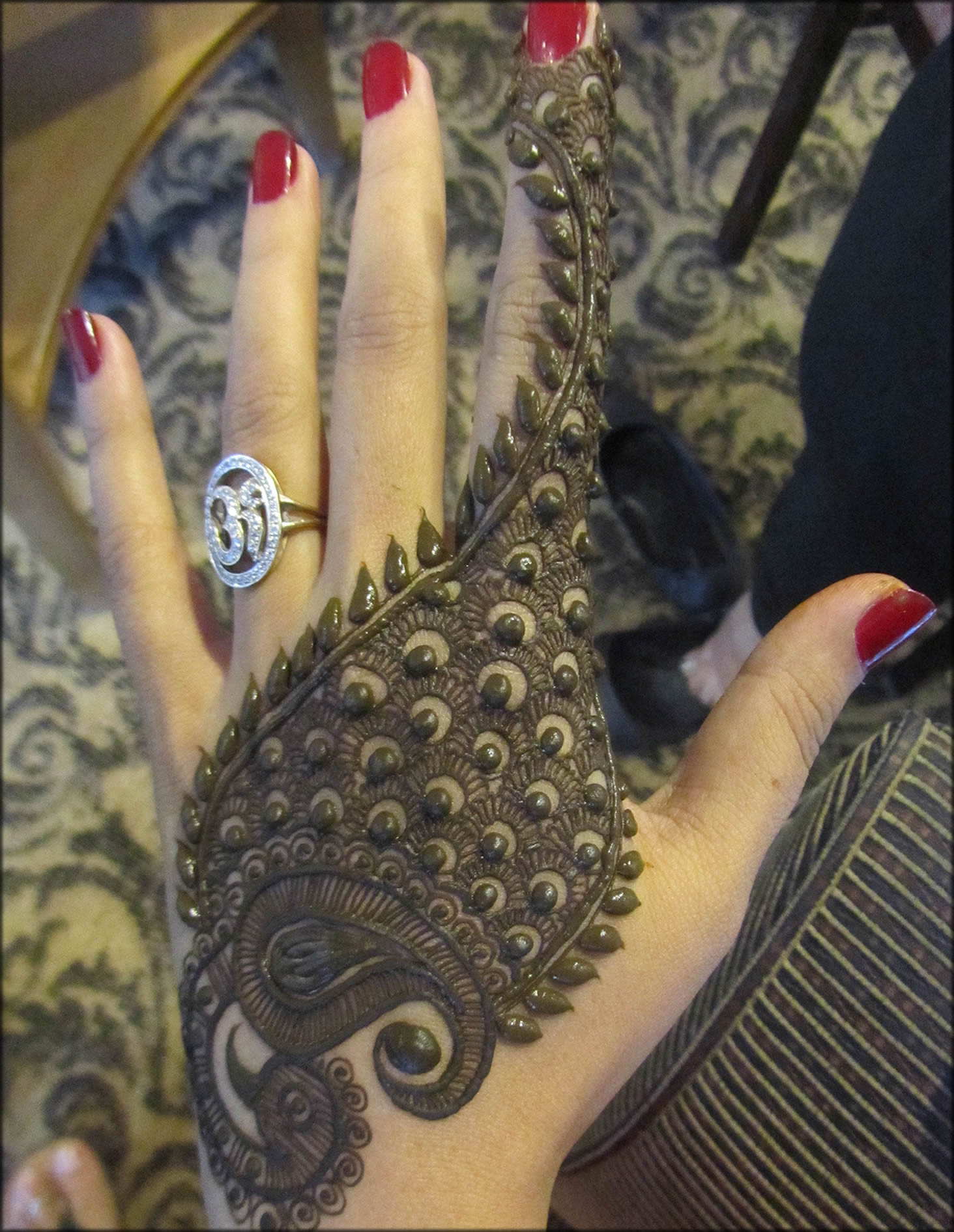 BackHand Peacock Feather Mehndi Art