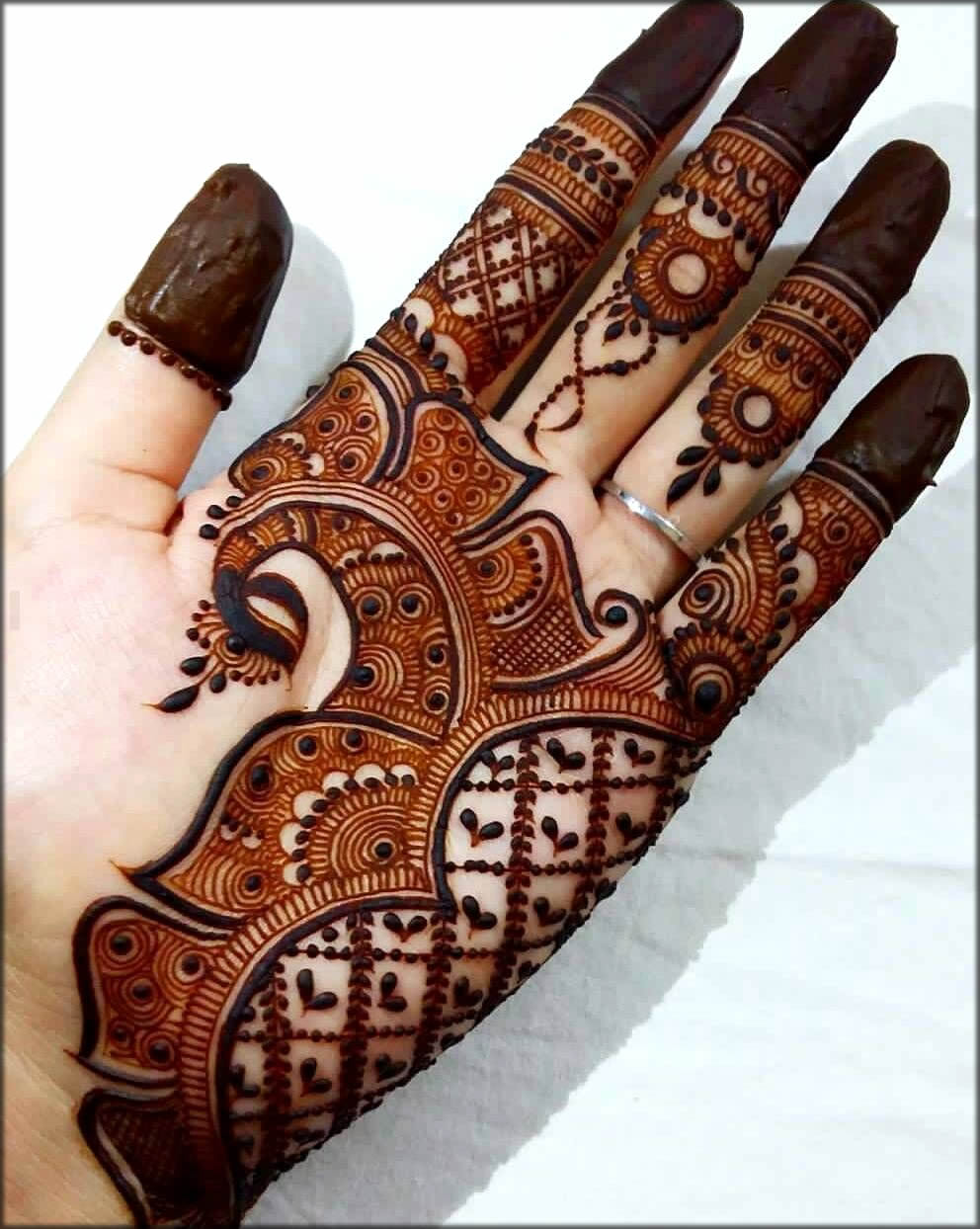 Dark Peacock Mehndi Design