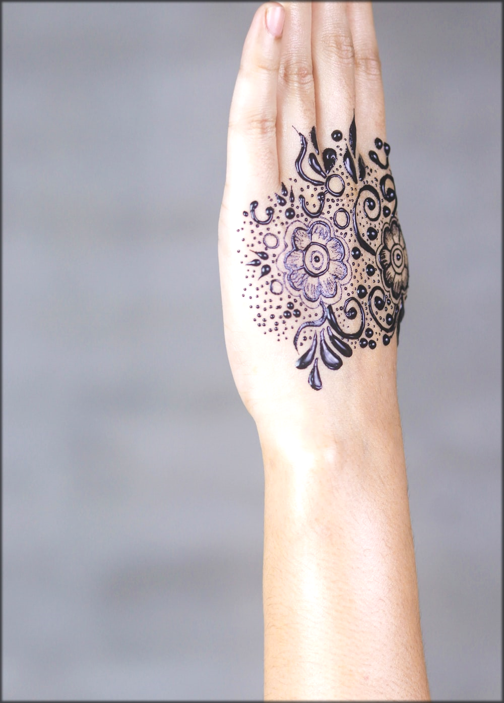Purple Petaled Flower Tattoo