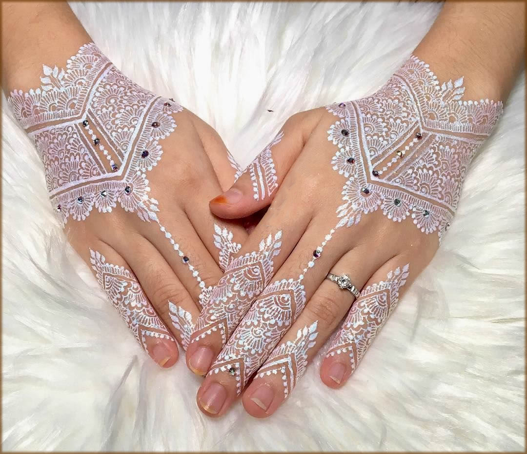 stylish white henna art with pearls