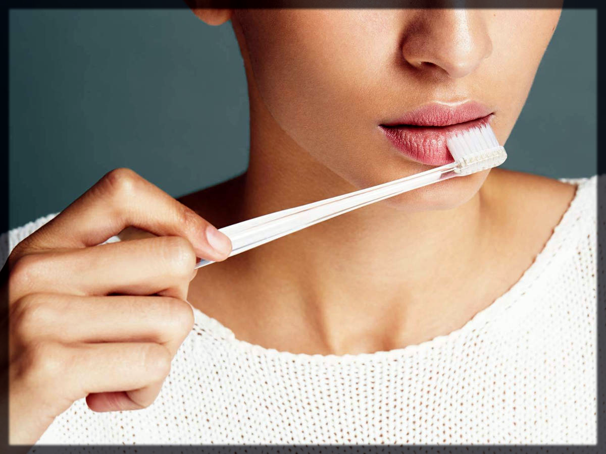 exfoliate lips with toothbrush