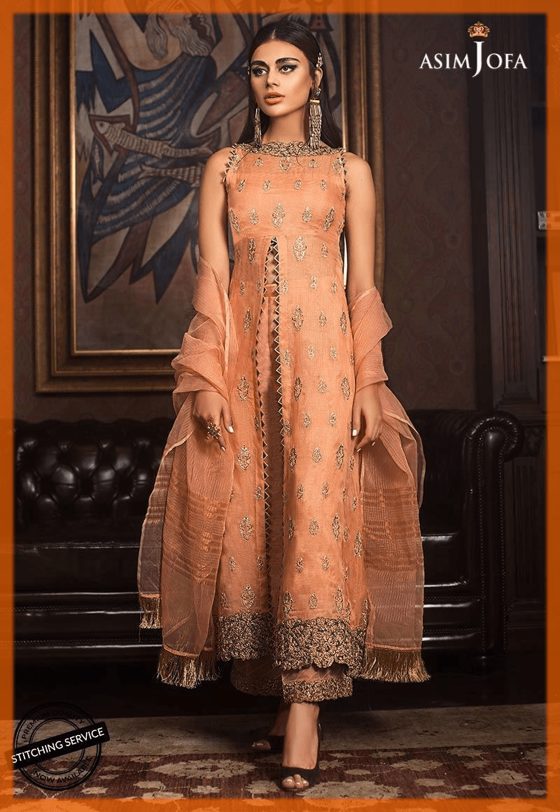 lavish dim orange pakistani party dresses