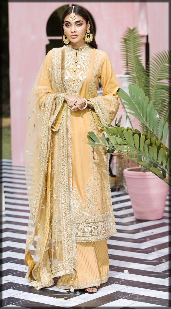 charming yellow luxury lawn suit