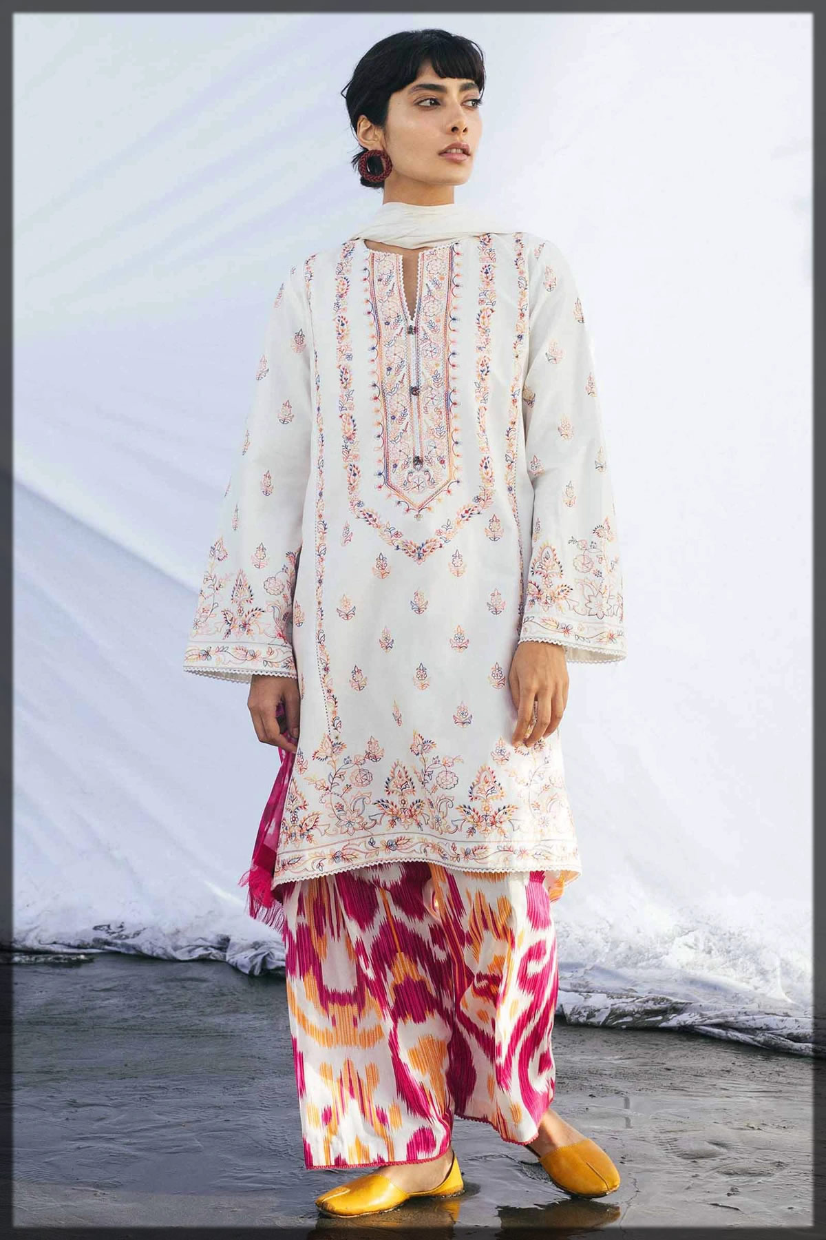 elegant white embroidered lawn suit