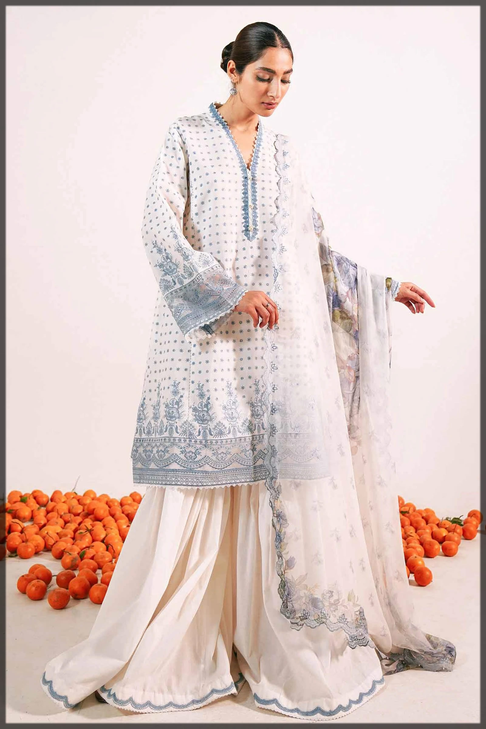graceful white embroidered lawn dress