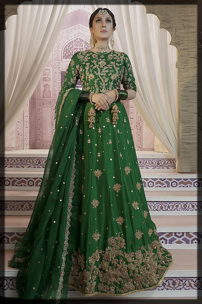 zardozi worked emerald green dress for mehndi bride